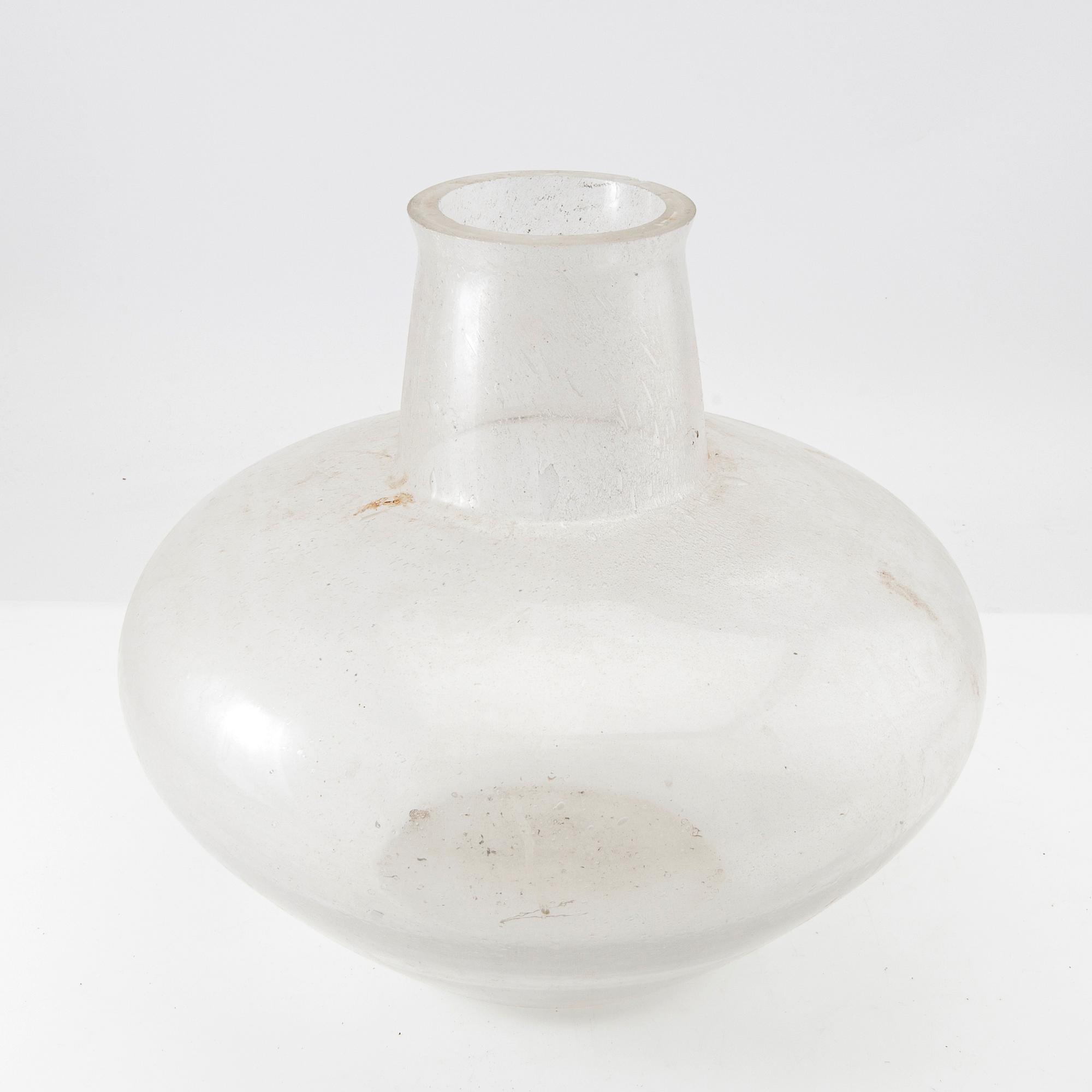 Glass dome for exterior lighting.