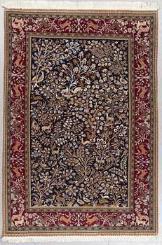 A rug, Old Qum, part silk, figural, ca 204 x 140 cm.