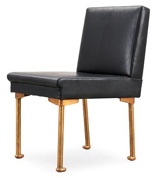 An Alvar Aalto bronze and black leather chair, Artek, Finland 1954.