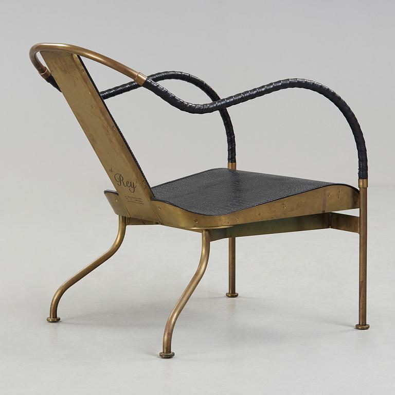 A Mats Theselius 'El Rey' brass and black leather easy chair, Källemo, Sweden 1999.