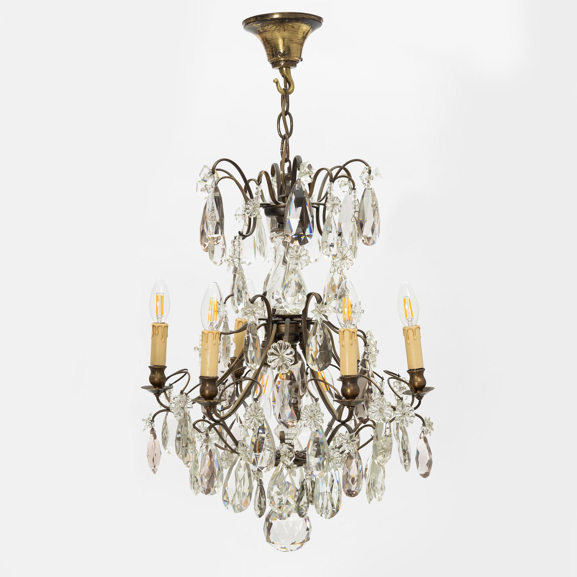 Takkrona, rokokostil, 1900-talets första hälft.