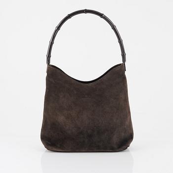 Gucci, a Bamboo suede bag.