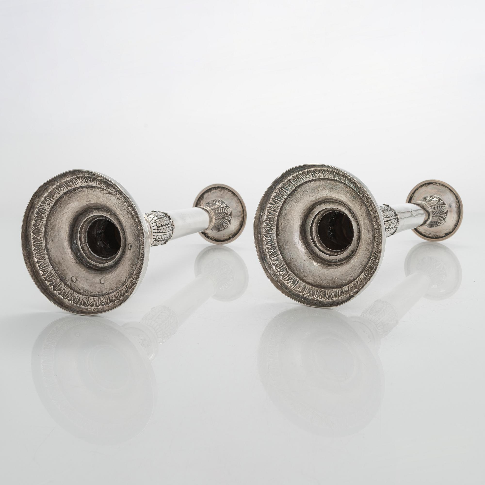 A pair of Empire silver candlesticks, Northern Europe, first half of the 19th century.
