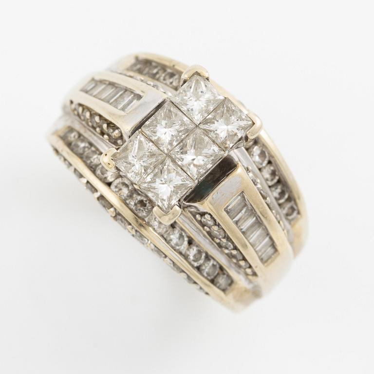 Ring, 14K gold with princess, baguette, and round brilliant-cut diamonds.