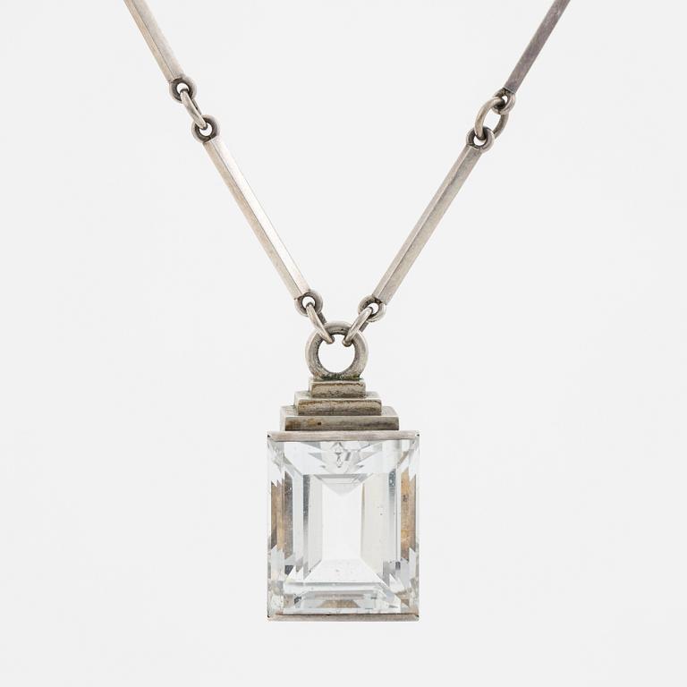 Wiwen Nilsson, hängsmycke, silver med fasettslipad bergkristall, Lund, 1937.
