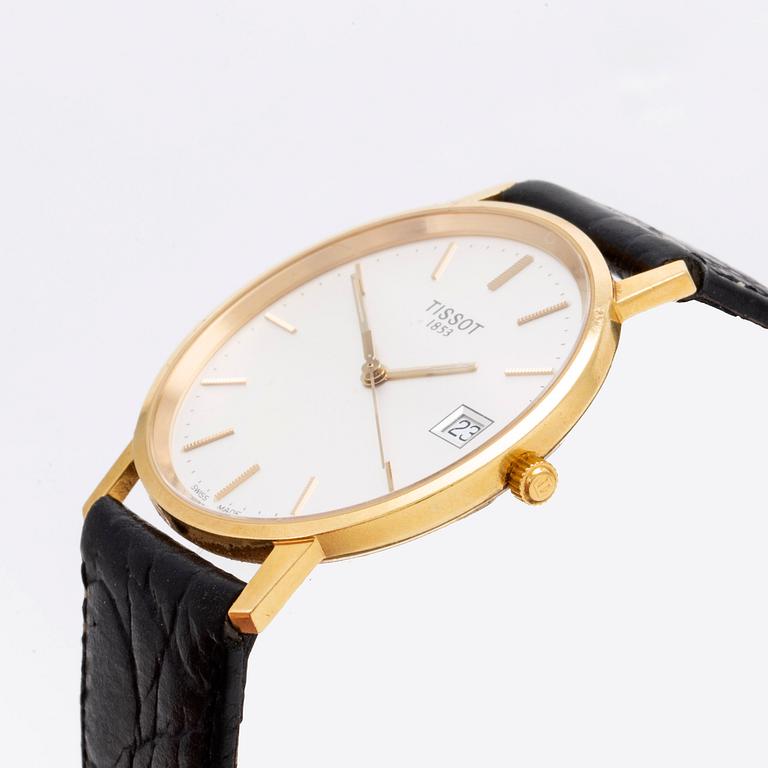 A Tissot 14 ct gold wrist watch 34 mm.