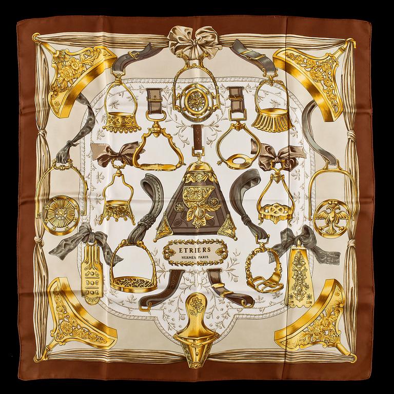 A set of three silk scarves by Hermès, "Etriers" and "Thalassa".