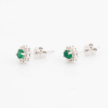 Emerald and brilliant cut diamond earrings.
