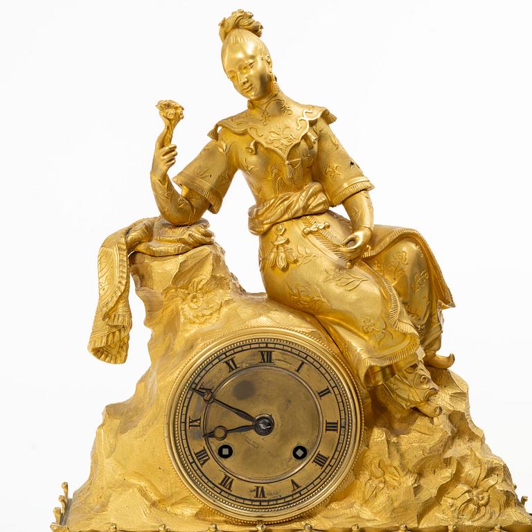 A Late Empire table clock, 19th century.
