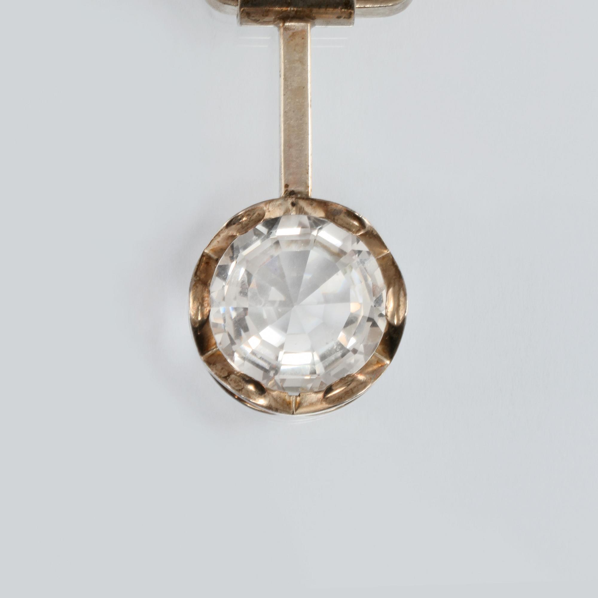 HALSLÄNK MED HÄNGE, silver med fasettslipad bergkristall, Cecilia Johansson, Göteborg, 1971. Vikt 105,6 gram.
