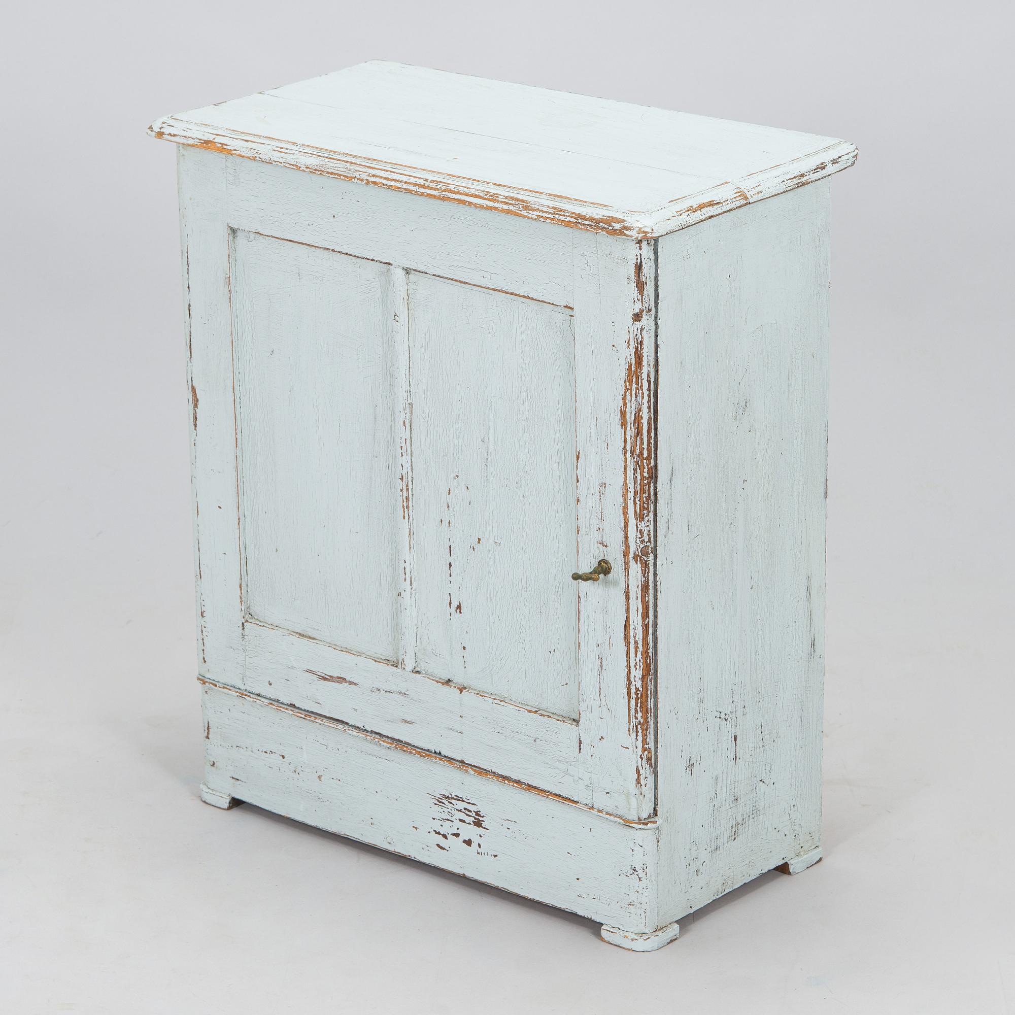 A painted cabinet, circa 1900.