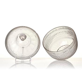 A cut glass punch bowl with cover, stand and ladle, Empire, first part of the 19th century.