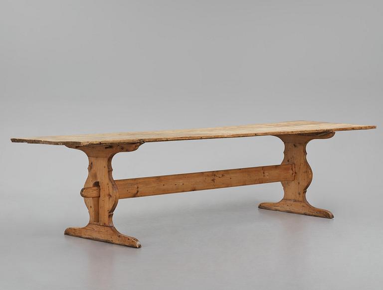 A pine trestle table, 20th century incorporating older elements.