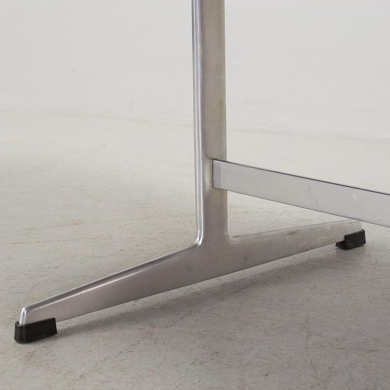 A rosewood top and aluminium coffee table, model 3315 by Fritz Hansen, Denmark 1968.