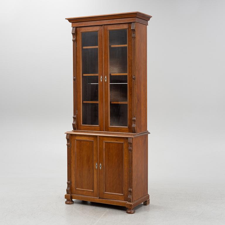 A pine cabinet, later part of the 19th Century.