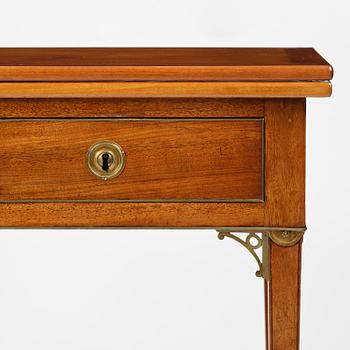 A late Gustavian mahogany games table, presumably by A. Nordström (Journeyman at G. Iwersson 1806-09).