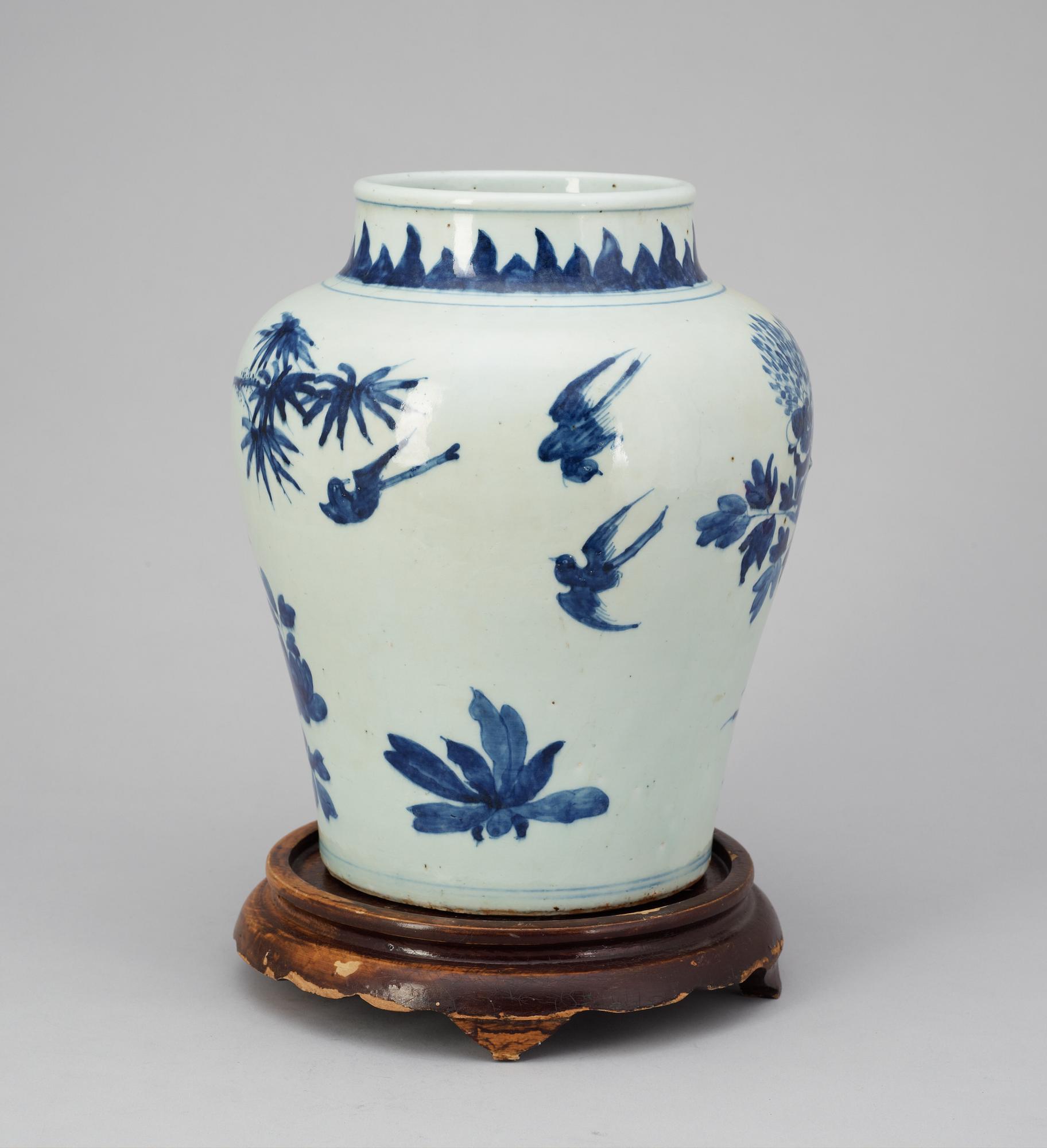 A blue and white Qing dynasty urn.
