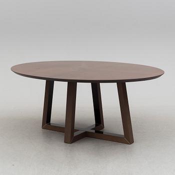 A circa 2000 dining table by Natuzzi, Italy.