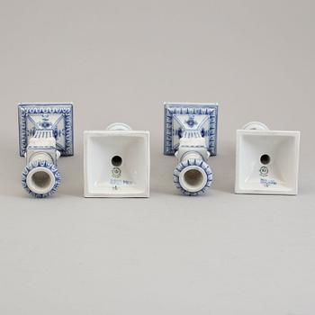 Two pairs of porcelain candlesticks by Royal Copenhagen, Denmark, third quarter of the 20th century.