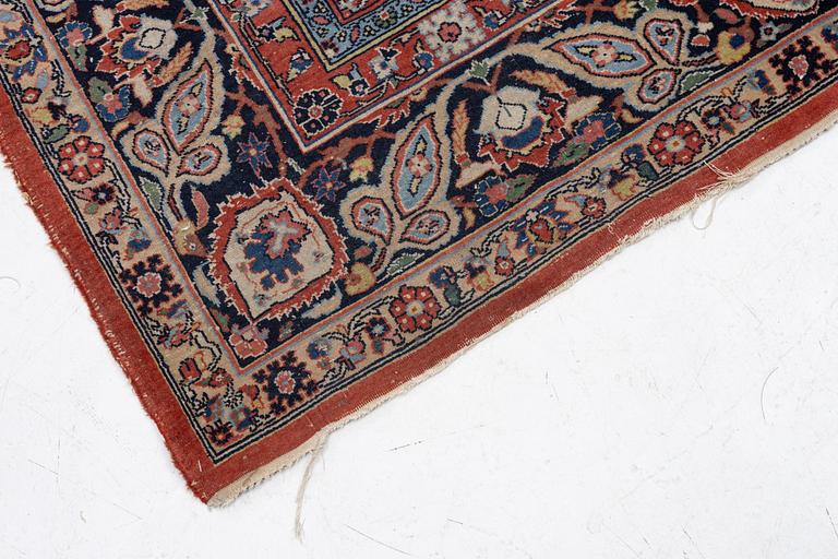 An oriental carpet, c. 370 x 275 cm.