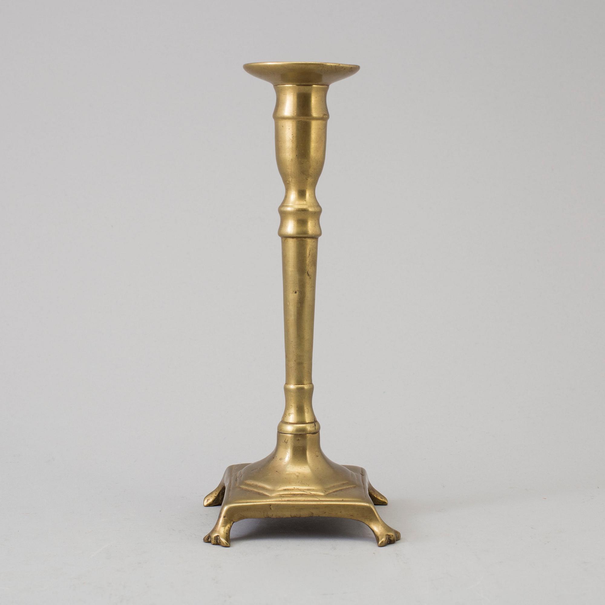 A BRONZE CANDLESTICK, 17th/18th century.