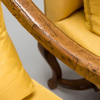 Two similar late Baroque French armchairs, first half of the 18th century.