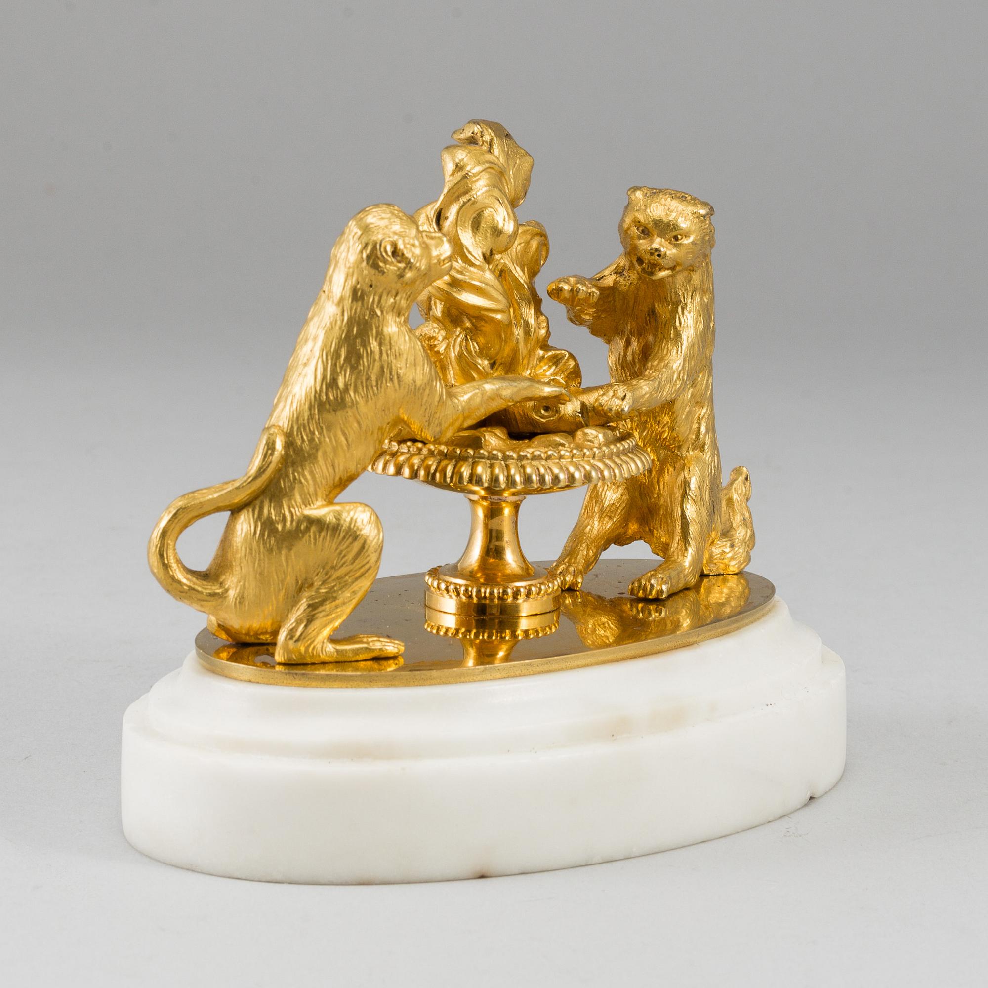 An ormolu and marble paperweight, France, first half of the 19th century.