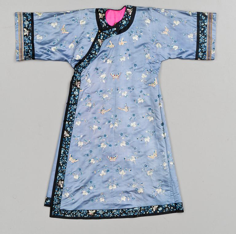 A Chinese embroided silk gown, around 1900.