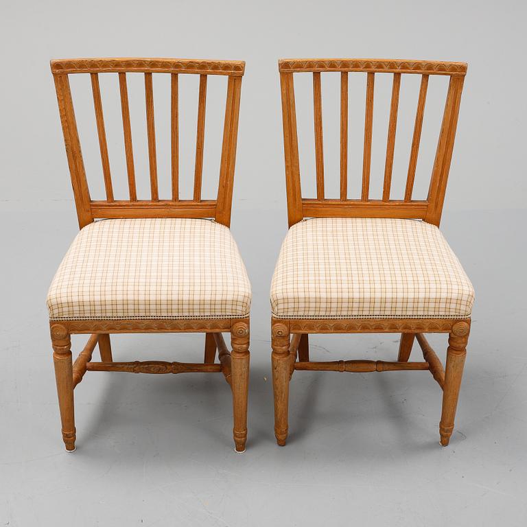 A pair of gustavian chairs, early 19th century.