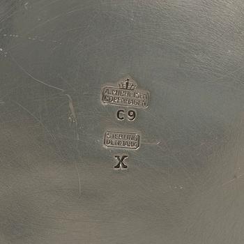 Three silver beakers, a vase and a cup, Sweden and Denmark, 19th-20th century.