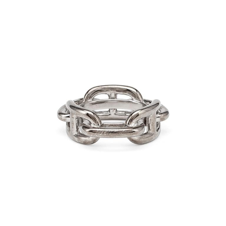 HERMÈS, a silver colored scarf buckle.