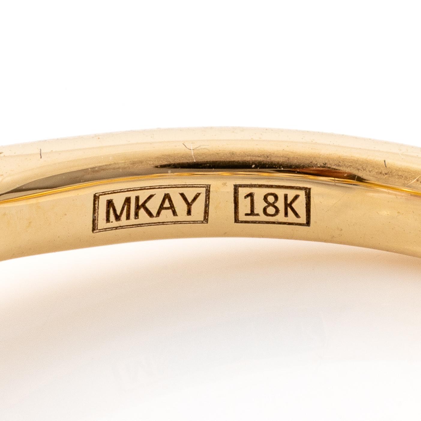 Mary Kay ring, 18K gold with a pink stone and white stones.