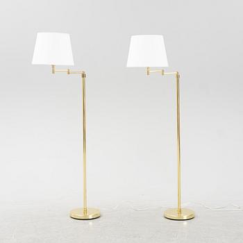 A pair of brass floor lamps, 1960's/70's.