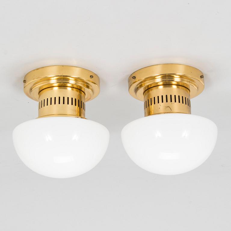 Klaus Michalik, A pair of 1960s wall/ceiling lights, 'Bau' model 971-504/H for Stockmann Orno, Finland.