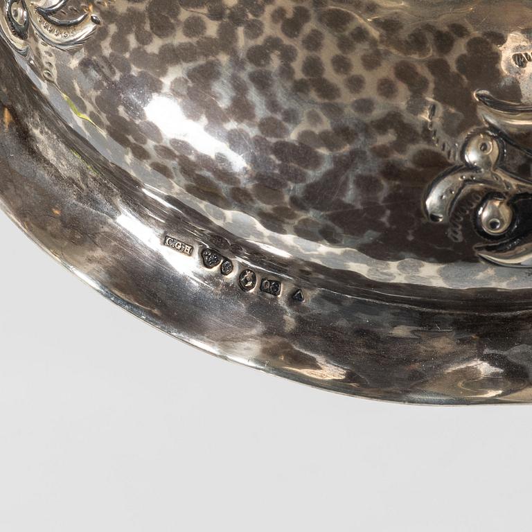 A pair of Baroque style silver candlesticks, marks of CG Hallberg, Stockholm 1942.