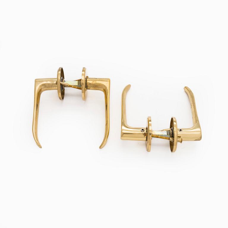 A set of 8 + 2 mid and late 20th century door handles.