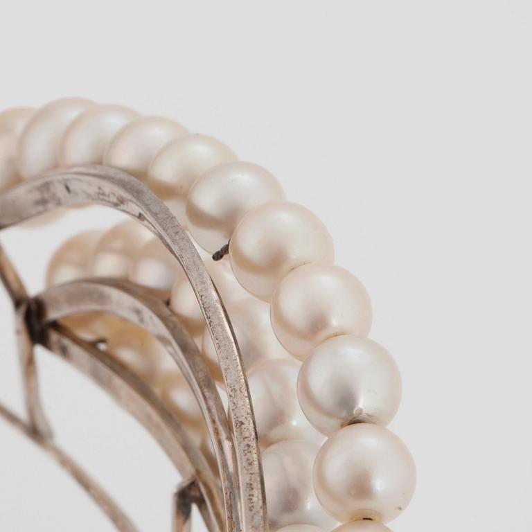 A TIARA with cultured pearls and a detachable brooch set with old-cut diamonds.