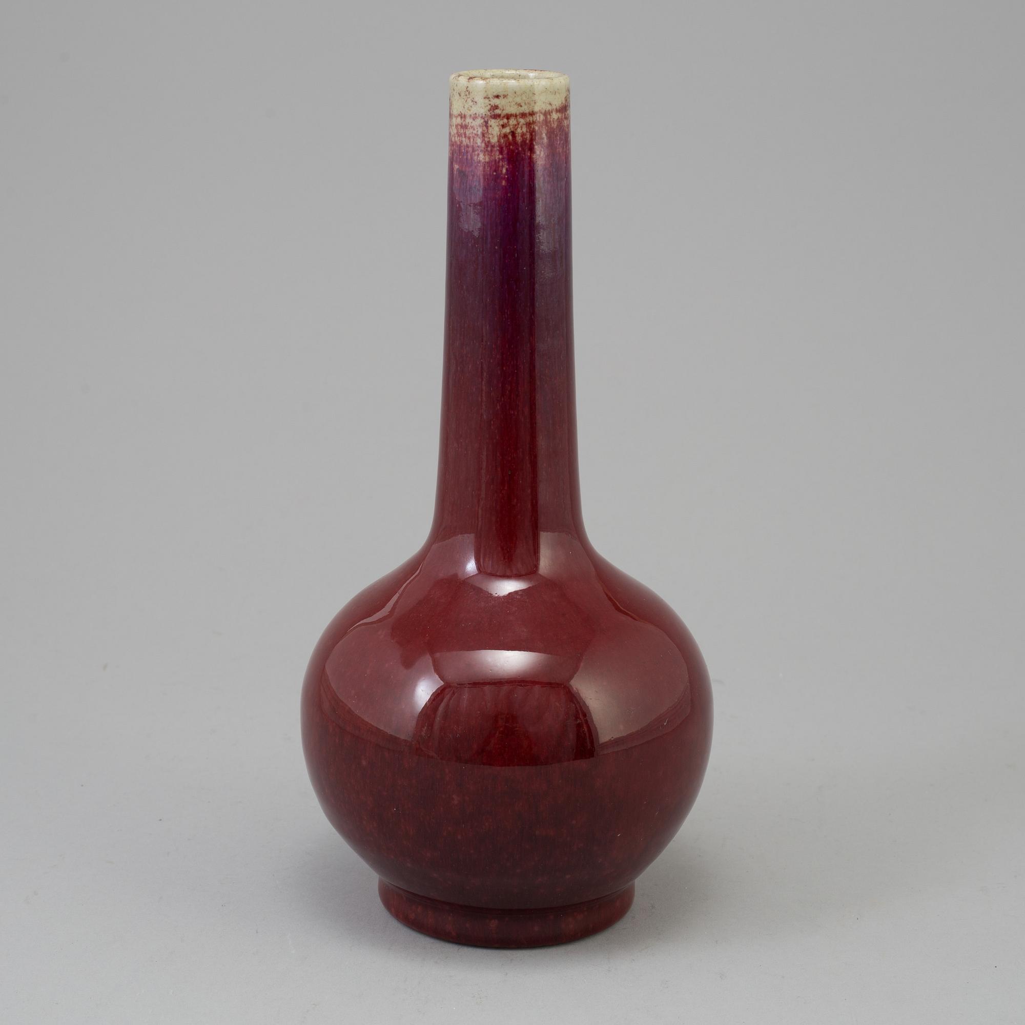 A Chinese copper red glazed bottle vase, presumably late 19th century.