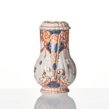 A Dutch Delft polychrome faience ewer, early 18th Century.