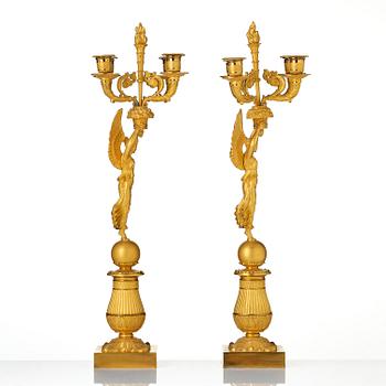 Kandelabrar, ett par, för fyra ljus, Frankrike, ca 1820-tal, Empire.