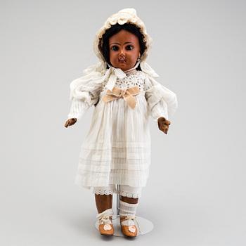 A bisque head doll, early 20th century.