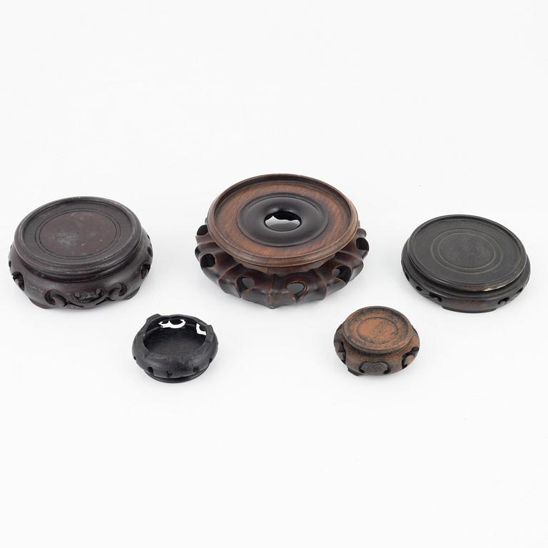 A group of Chinese wooden stands, 19th/20th Century. (14 pieces).