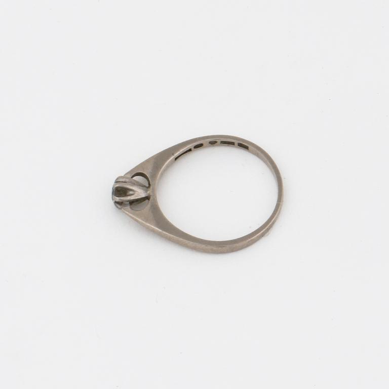 A brilliant cut diamond ring.