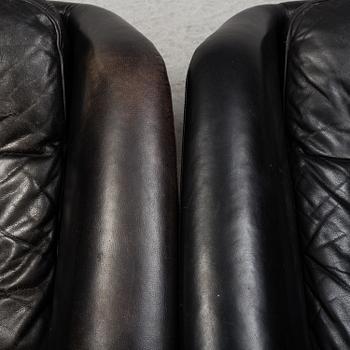 ALF SVENSSON, a pair of 'Form 7' leather upholstered easy chairs from DUX, 1970's.