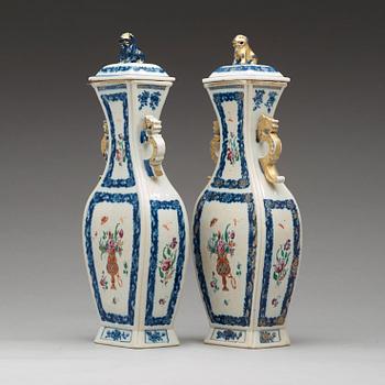 A pair of famille rose vases with cover, Qing dynasty, Qianlong (1736-95).