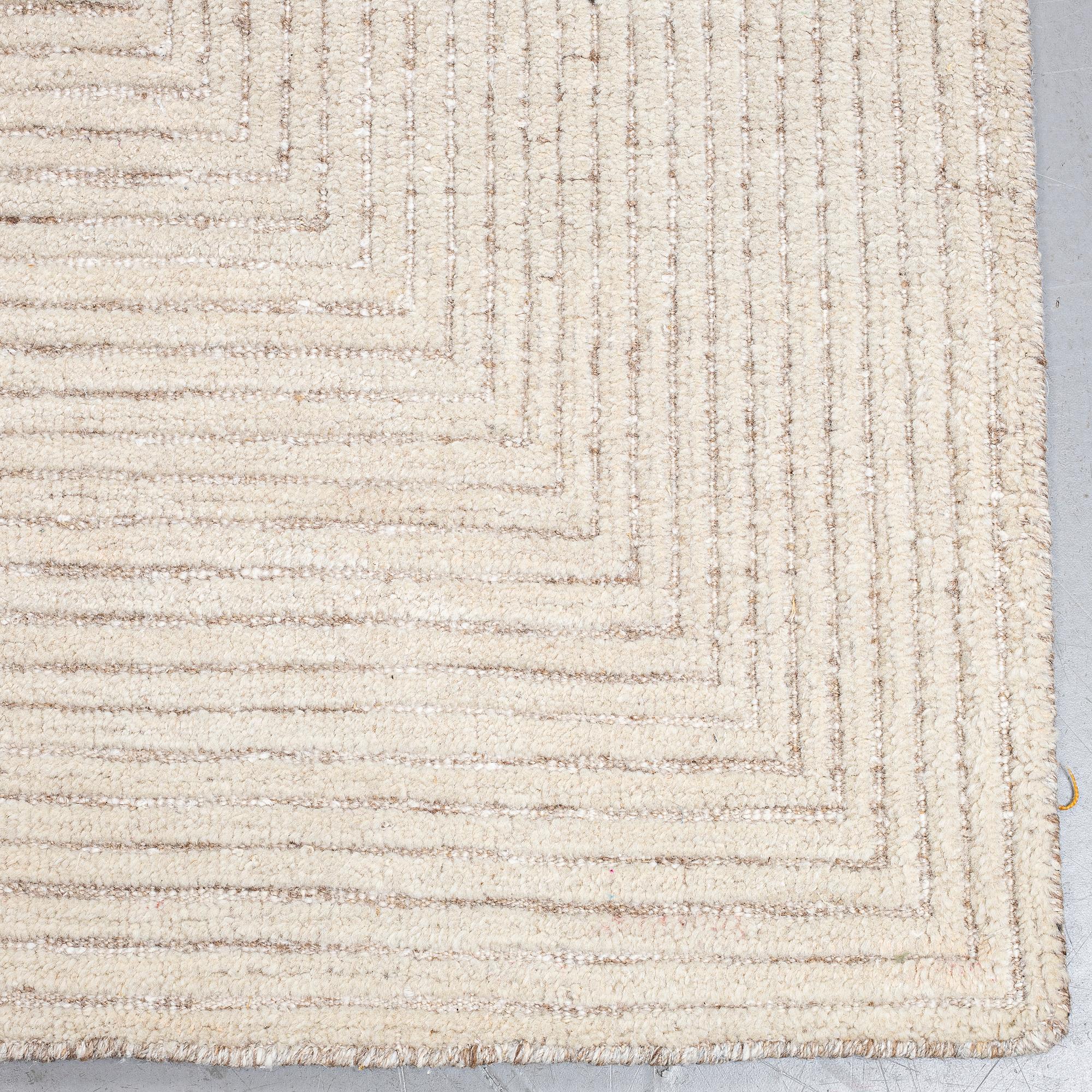 A CARPET, "Maze", loomed i relief, ca 317 x 160 cm.
