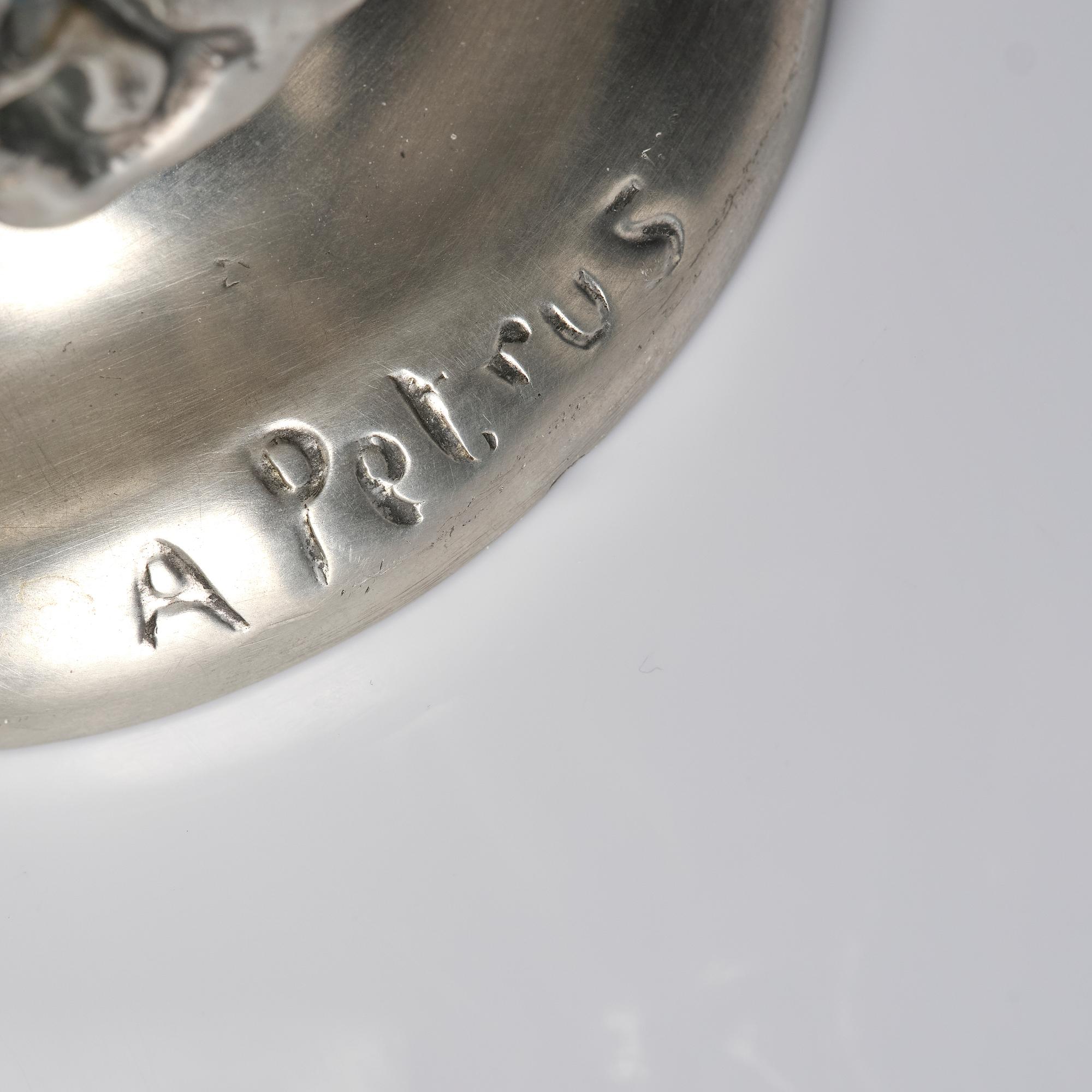 Anna Petrus, a pewter vase, 'Janushuvud', Firma Svenskt Tenn, Stockholm, 1974.