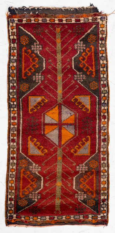 An antique, central Anatolian yastik fragment, c. 113 x 53 cm.