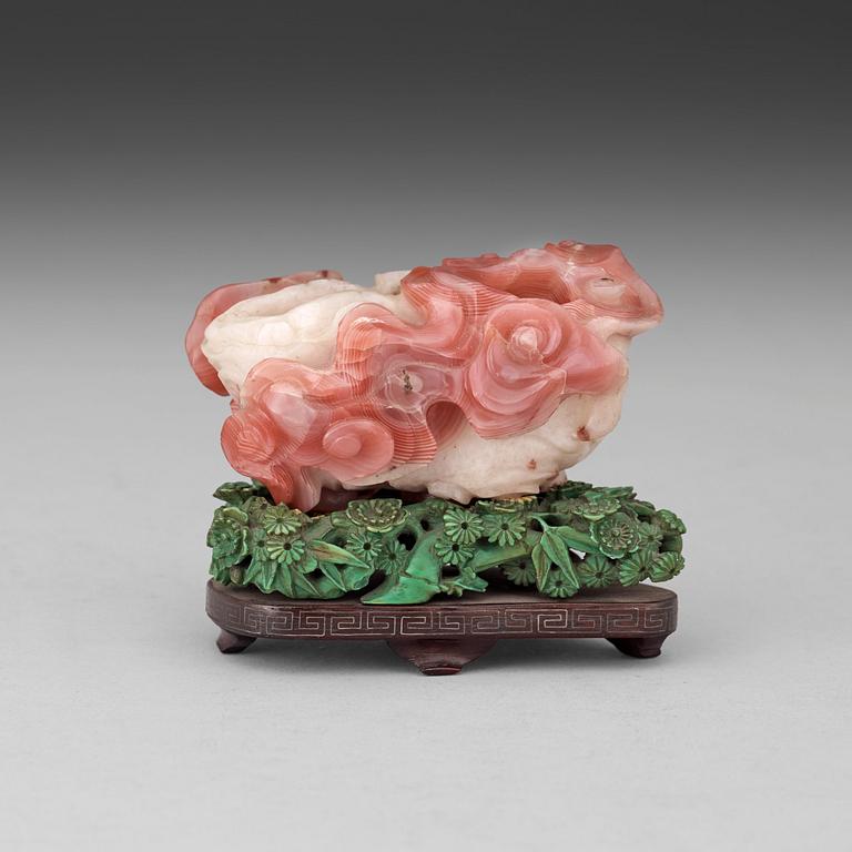 A possible agathe brush washer, with a stained green stand, Qing dynasty, presumably Qianlong (1736-95).