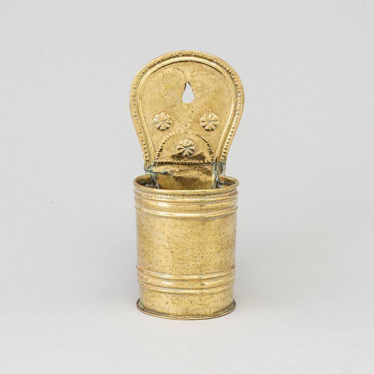 A 18th/19th century brass spoon holder.